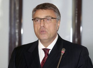 Albania's central bank governor Fullani speaks during a news conference in Tirana