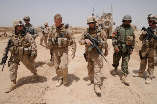 100628-N-0475R-287 MARJAH, Afghanistan (June 28, 2010) Seabees, Marines, Soldiers and members of the Afghan National Army take a tour of an area surrounding a newly completed Mabey-Johnson Bridge project. (U.S. Navy photo by Mass Communication Specialist 2nd Class Ace Rheaume/Released)