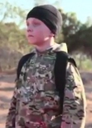 Stills from ISIS execution video showing a group of children executing 5 prisoners. One of which is a white child executioner with jihadi fighter name 'Abu Abdullah Al-Britani' ***TMoS GRABS***